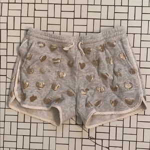 grey sweatshirts with gold hearts